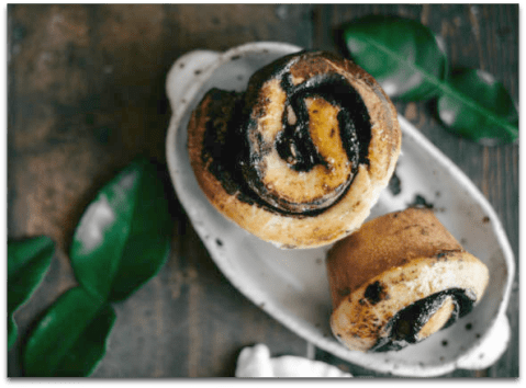 Black tahini buns with white chocolate & orange