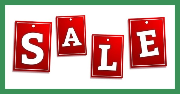 The letters S-A-L-E inside a frame