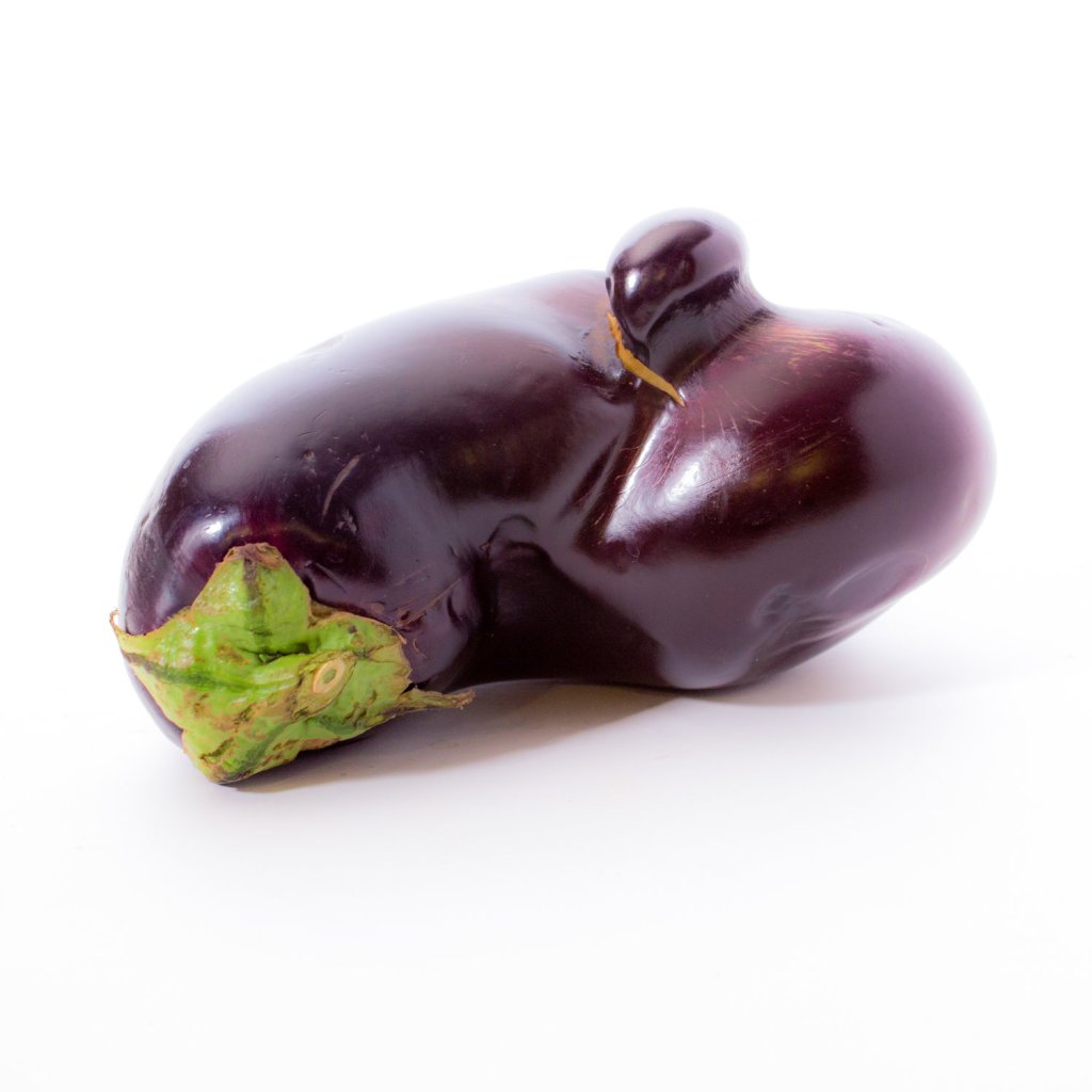 Misshapen eggplant is a good example of imperfect produce that contributes to food waste.