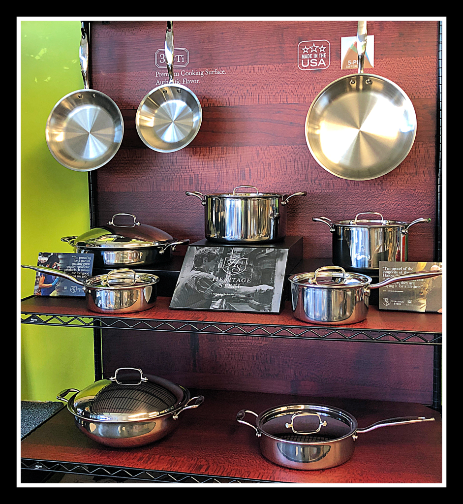 Display of Heritage Steel multi-clad cookware.